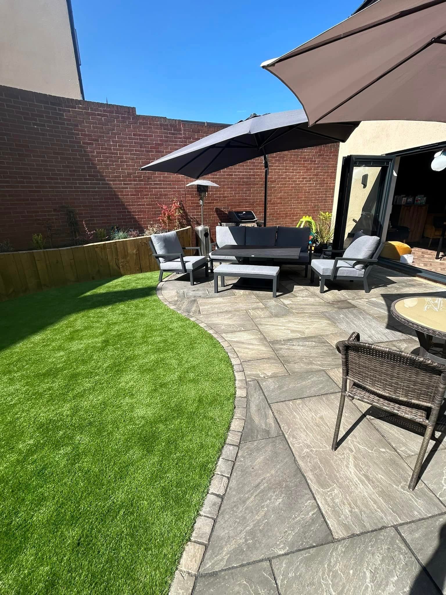 Patio with outdoor furniture and artificial grass